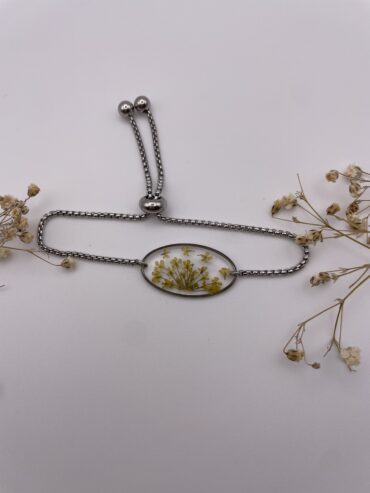 Pulsera ovalada con florecitas amarillas
