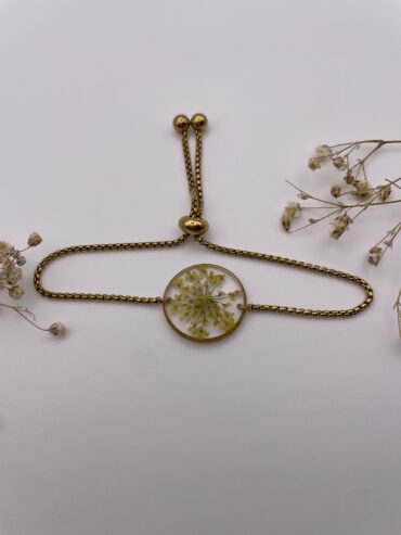 Pulsera redonda con florecitas amarillas