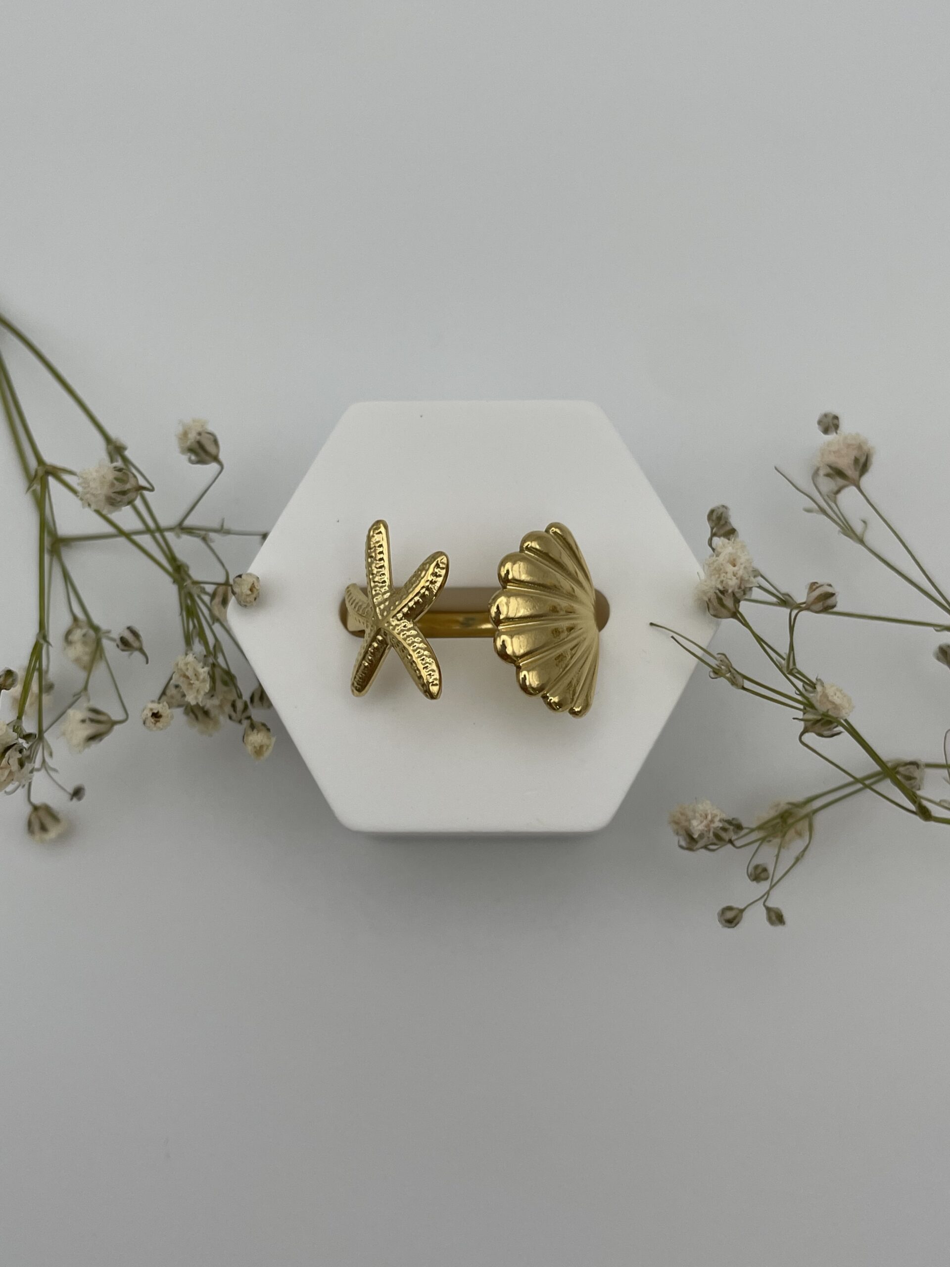 Anillo estrella y concha
