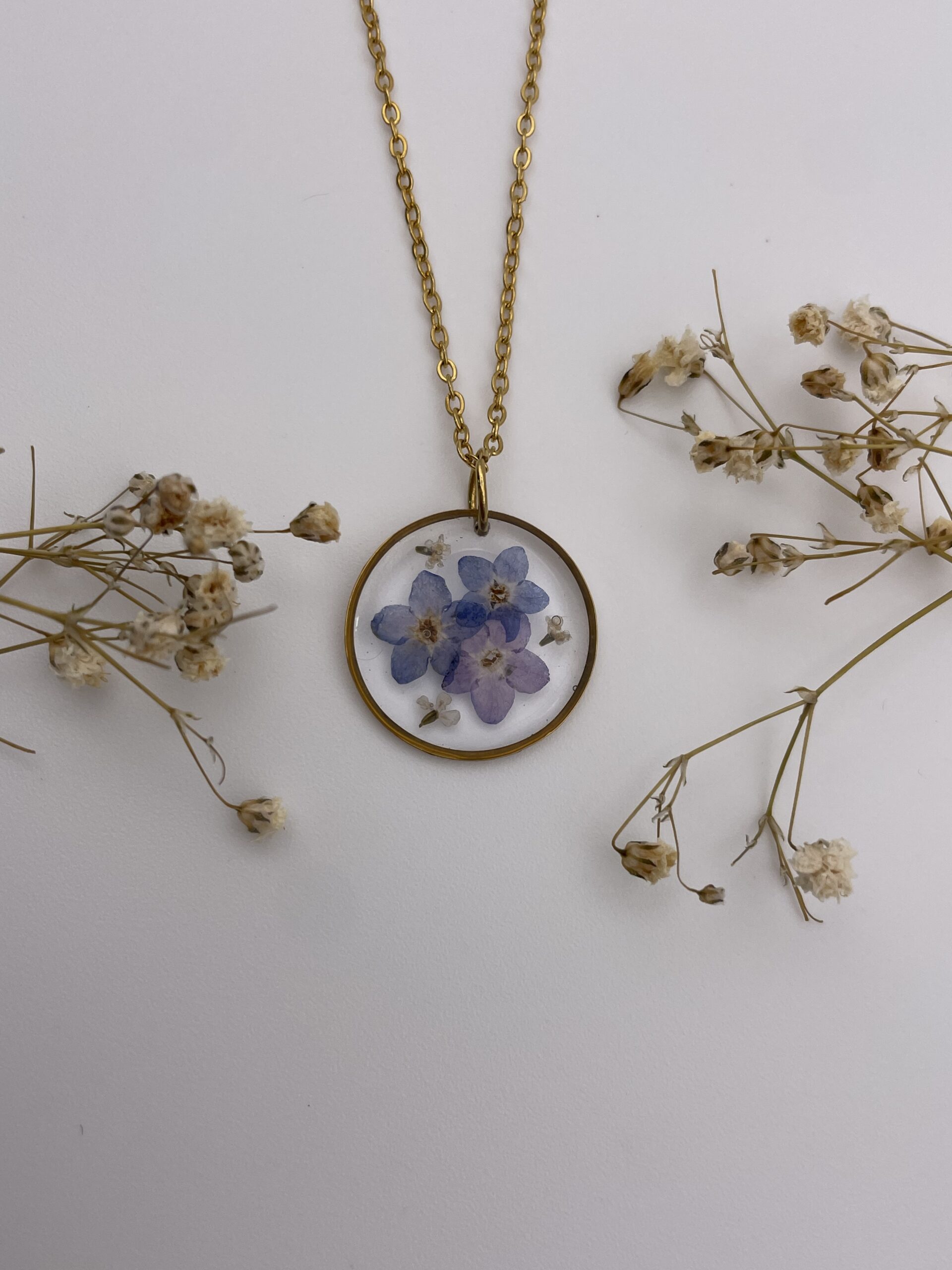 Collar redondo con flores azules - Imagen 2