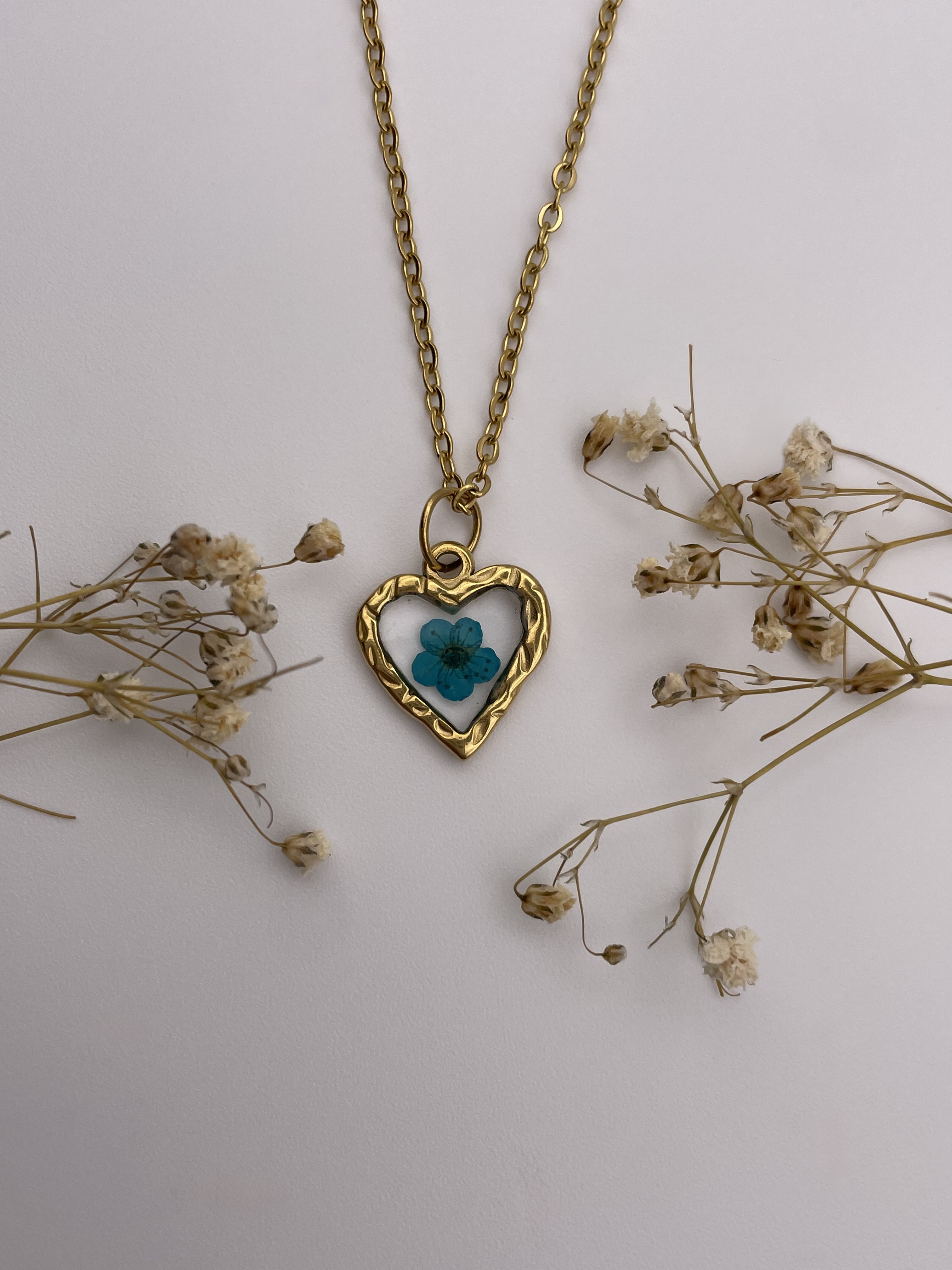Collar corazón grueso con flor azul - Imagen 2